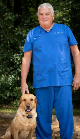 Dr. Bryan T. Sullivan, DPM, with his dog Smokey